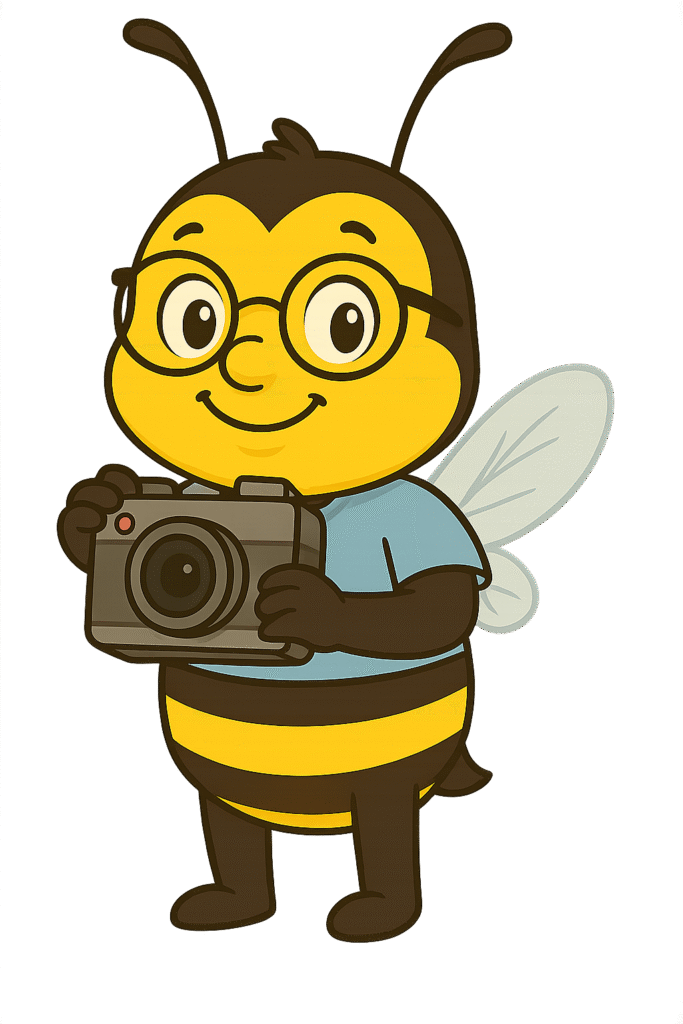 Maskoten Billie håller i en kamera